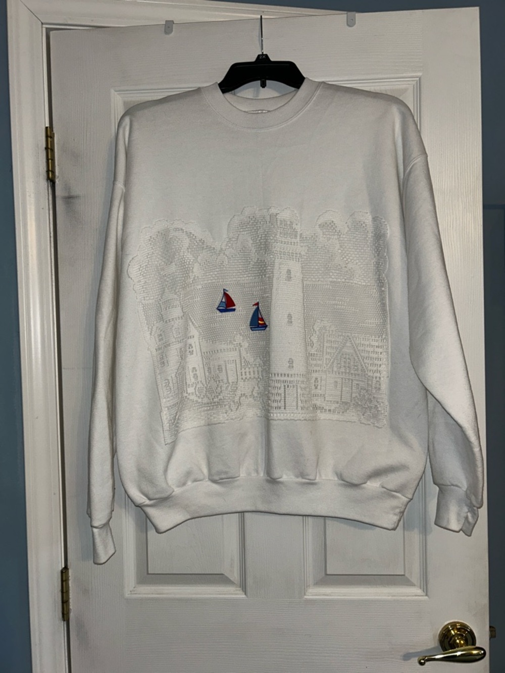 Hanes White Crewneck Sweater with Small Red and Blue Sailboat Embroidery